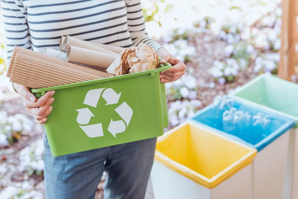 person with recyclable packaging