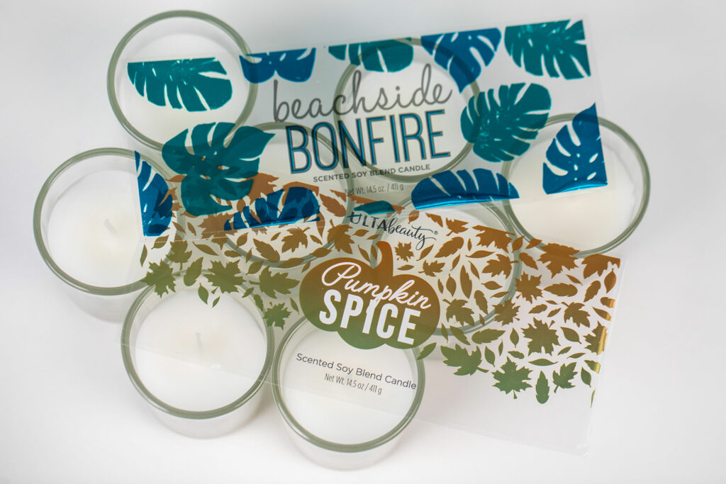 Clear candle jar labels on display.