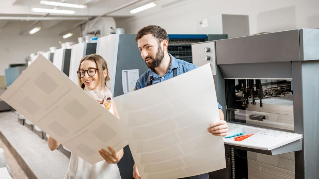 Meyer's staff inspecting a print