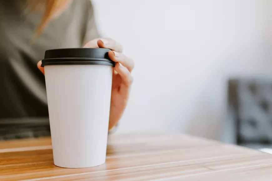 black plastic coffee lid